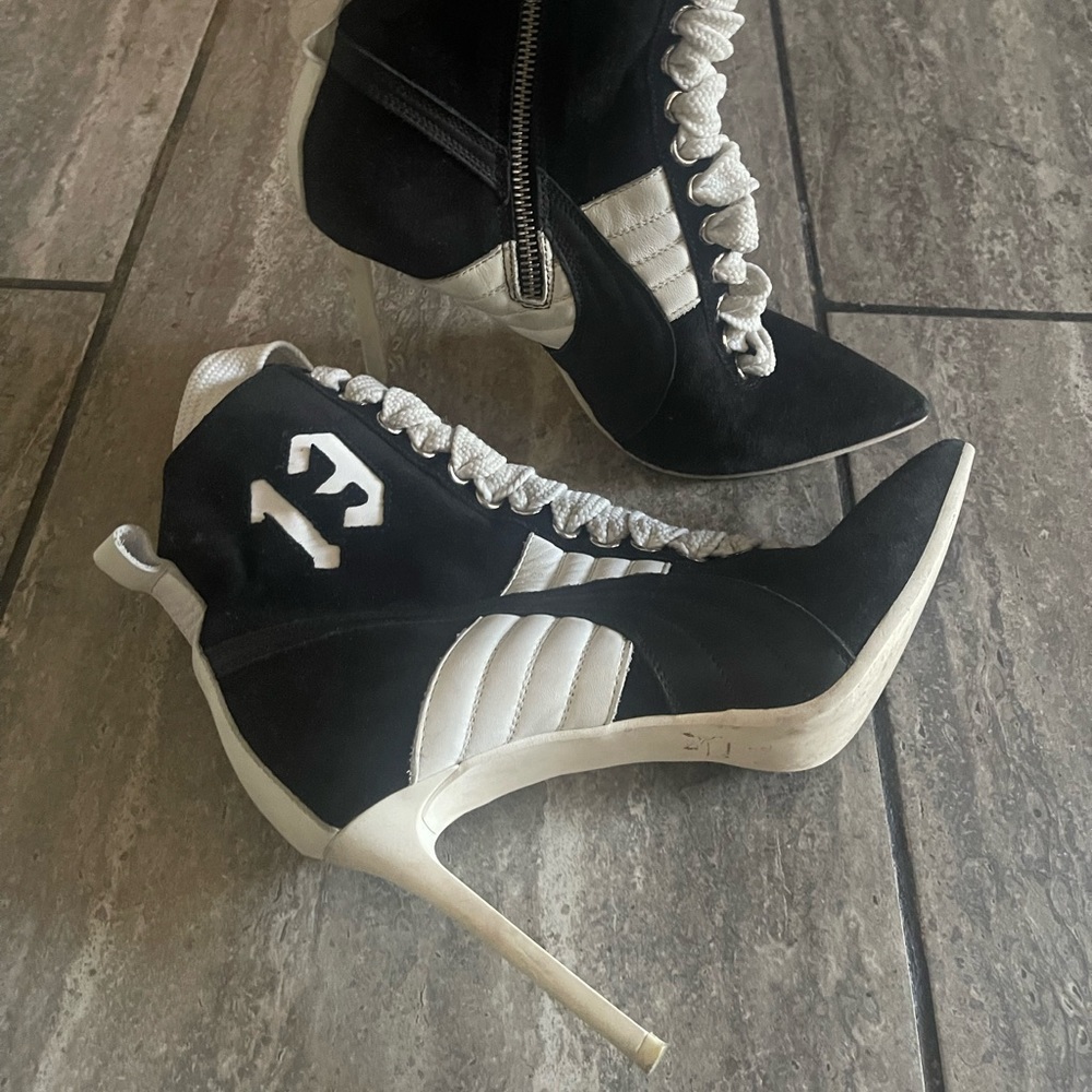 Puma by Rihanna Sneaker Heel Size 7.5. Black and white with white laces.